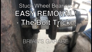 Stuck Wheel Bearing EASY REMOVAL The Bolt Trick [upl. by Ulah517]