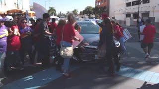 Man drives through protesters blocking road in Southern California [upl. by Yovonnda]