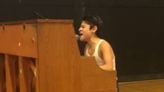 Kid performs Bohemian Rhapsody in front of whole school [upl. by Arvonio856]