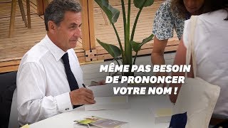 Sarkozy dédicace son livre a un rythme effréné et il a une astuce [upl. by Ahsikyw769]