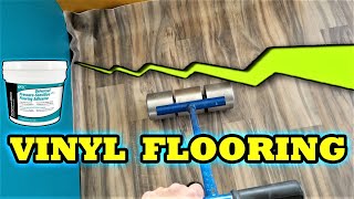 How to glue down and seam Vinyl sheet flooring [upl. by Ahsaela742]