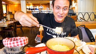 Swiss Food Tour  CHEESE FONDUE and Jumbo Cordon Bleu in Zurich Switzerland [upl. by Norramic]